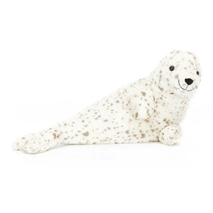 Jellycat Sigmund Seal, a charming and soft plush seal with a fluffy grey fur, cute black nose, and expressive round eyes, perfect for snuggling and cuddling up with.