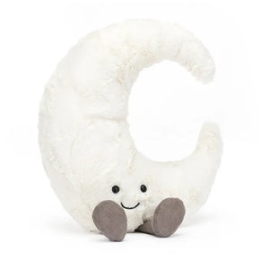Jellycat Amuseable Moon children’s soft toy is a white crescent shaped moon with a smiling face and wears grey corded boots. 