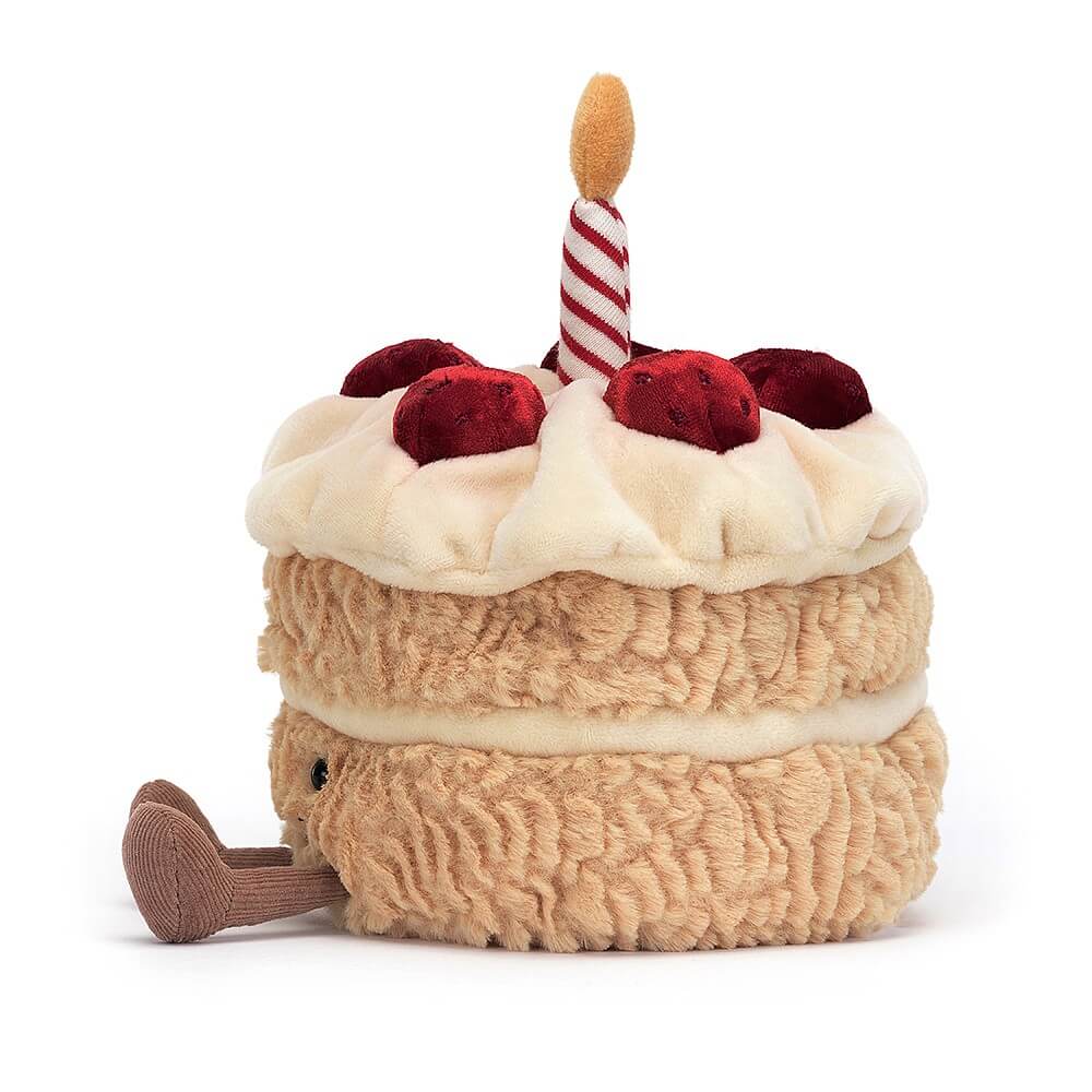 From the side Jellycat Amuseables Birthday Cake children’s soft toy. 