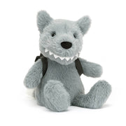 Jellycat Backpack Wolf children’s soft toy is covered head to toe in grey fur. He has pointy ears and sharp suede protruding teeth. On his back he wears a matching backpack. 