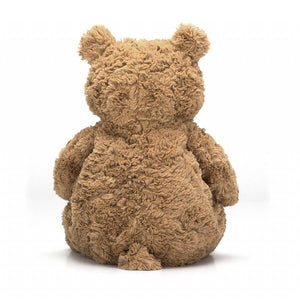 From behind the Jellycat Bartholomew Teddy Bear covered in thick brown fur. 