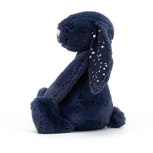From the side Jellycat Bashful Bunny Stardust children’s soft toy in blue with shiny stars.