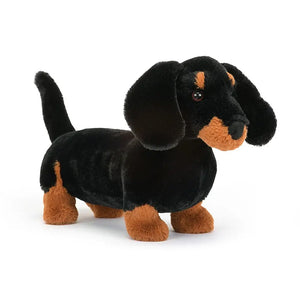 Jellycat Freddie Sausage Dog Large children’s soft toy with black and ginger soft fur covering his body. 