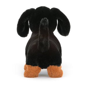 From behind Jellycat Freddie Sausage Dog Large children’s soft toy. 