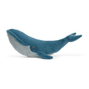 From the side Jellycat Gilbert The Great Blue Whale children’s soft toy showing his full length.
