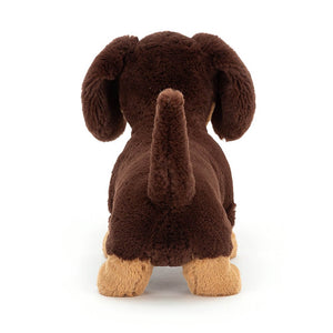 From behind, Jellycat Otto Sausage Dog children’s soft toy in large. 