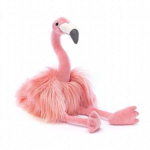 Jellycat children’s toy pink flamingo on white background.