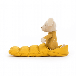 Side view of the Jellycat Snugglers Puppy sitting inside his sleeping bag with the top down.