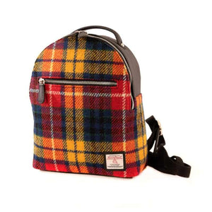 Maccessori Harris Tweed Backpack in a red, yellow and orange check tartan design. Sitting against a white background.