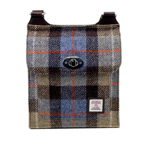 Harris Tweed Satchel bag with a brown, grey and blue check tartan design and shoulder strap across the back. 