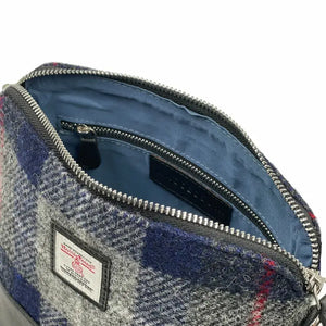 Inside the Maccessori Harris Tweed Square Shoulder bag with the top zip open and showing the lining and internal zipped pocket. 