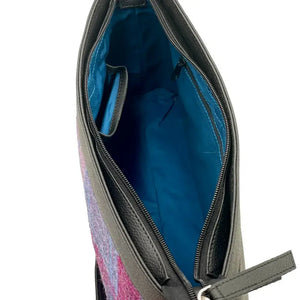 Inside the Maccessori Large Harris Tweed Shoulder Bag showing the lining, internal pocket and zipped compartment. 