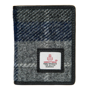 Mens Harris Tweed slim vertical wallet in a blue and grey check tartan pattern.