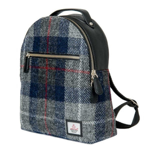 Maccessori Harris tweed backpack in a grey and blue check tartan design against a white background.