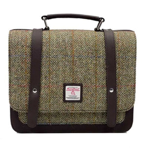 Harris Tweed mini messenger bag with strapping and finished in a green and brown herringbone design.
