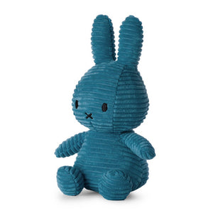 From the side Miffy Sitting Corduroy bunny in an aviator blue colour.